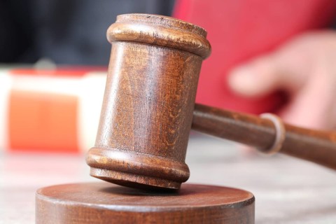 Close-up of a judge's gavel as a symbolic image for a court judgement