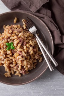 Pasta with stewed meat, pasta in the navy, horns, homemade, no people