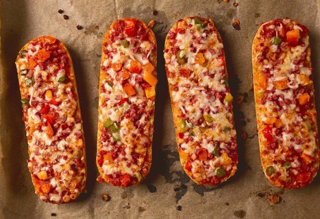 Pizza on a baguette, top view, close-up, no people, fast food, street food