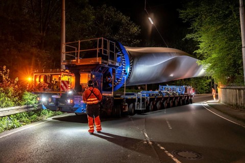 Transport of a 68 metre long, 22 tonne blade of a wind turbine, here in Schwelm, with a