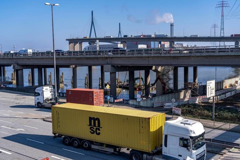 The Köhlbrand Bridge in the Port of Hamburg, rear, front trucks on the Waltershoferdam, access to