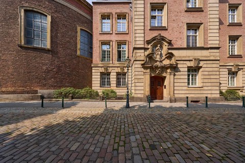 Entrance to a historic building and St Joseph's Chapel on Altestadt street in the old town of