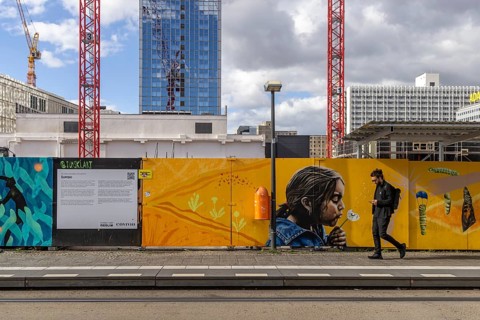 Construction site, construction fence and crane at Alexanderplatz in Berlin, Germany, Europe