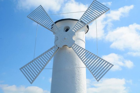 Detail of lighthouse, The Windmill at the harbor in Swinoujscie, West Pomerania, Poland, Eastern