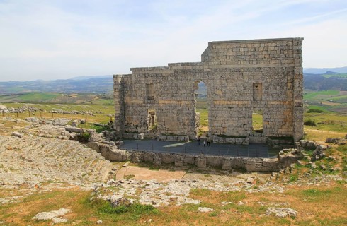 Remains of Roman theatre stage background wall and seating area, Acinipo Roman town site Ronda la