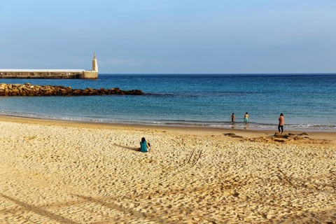 Sandy beach beach, Playa Chica with tourists, Tarifa, Strait of Gibraltar, Costa de la Luz,
