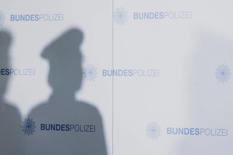 The shadow of a policewoman, taken as part of a press statement on the occasion of the opening of