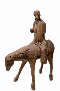 Palm tree donkey, wooden figure from around 1350, on a white background, Diocesan Museum,