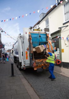 Refuse recycling vehicle in the streets of the town of Woodbridge, Suffolk, England, United