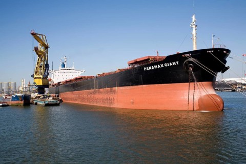 Cargo ship 'Panamax Giant' in shipyard at Botlek, Port of Rotterdam, Netherlands