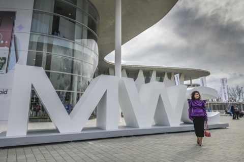 Visitor outside the exhibition centre, MWC Mobile World Congress 2024, Barcelona, Spain, Europe