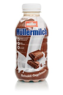 Müllermilch chocolate flavour in the bottle of the company Theo Müller cut out in front of a white