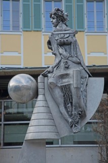Sculpture Fortuna by Jürgen Goertz 2012, female figure, sitting, sphere, modern, abstract, bizarre,