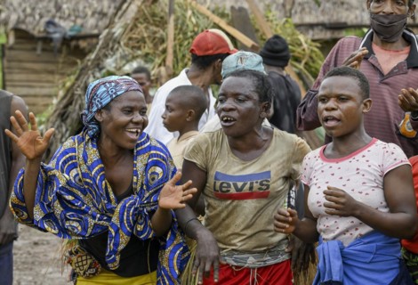 Pygmy woman of the BaAka people dancing and singing, Libongo, Est region, Cameroon, Africa