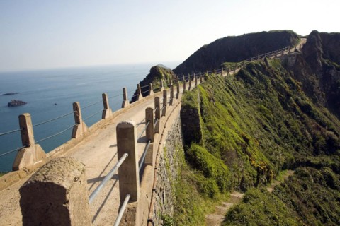 La Coupee narrow track between Little Sark and Sark, Island of Sark, Channel Islands, Great Britain