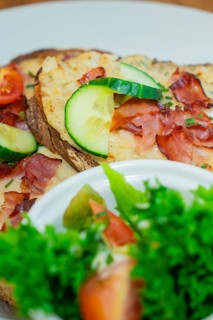 Close-up of a loaf of bread with vegetables and salad on a plate, autumn creations, Cafe Kuh,