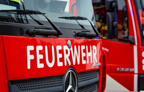 Duisburg, North Rhine-Westphalia, Germany, Fire brigade exercise. Fire engine with flashing blue