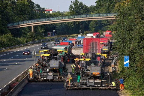 Essen, North Rhine-Westphalia, Germany, Road construction, Asphalt pavers and road rollers lay new,