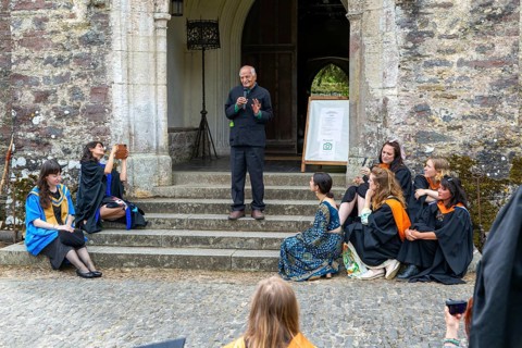 Satish Kumar speaking at graduation event, Schumacher College, Dartington Hall estate, Totnes,