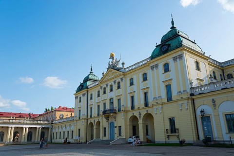 Baroque palace with green domes and blue sky, elegant historical architecture, Branicki Palace,