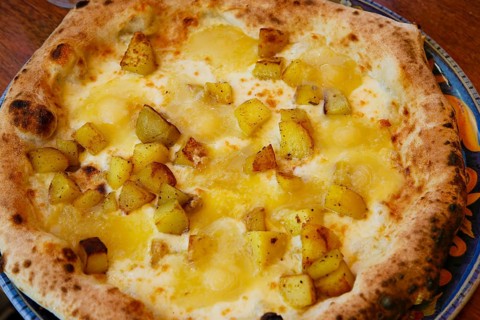 Italian cuisine, Mediterranean cuisine, pizza with potatoes and cheese, Taleggio, baked, from the