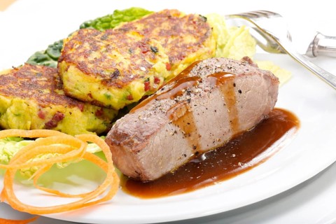 Swabian cuisine, medallions of wild boar with savoy cabbage cakes, meat dish, roasted, hearty, home