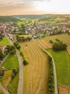 Pretty village nestled in a varied landscape at sunset, Dachtel. Black Forest, Germany, Europe