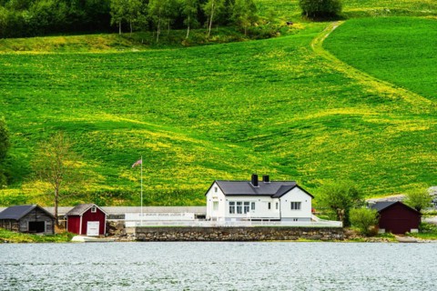 Mountains and Fjord over Norwegian Village, Olden, Innvikfjorden, Norway, Europe