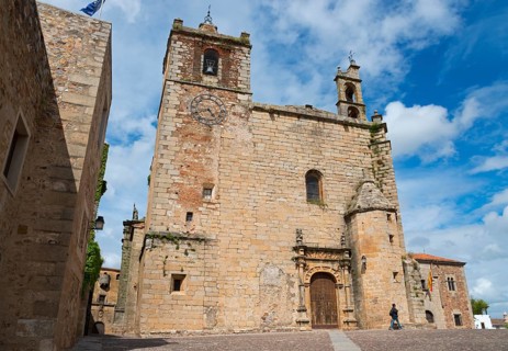Historic church with ornate bell towers under a blue sky, Iglesia de San Mateo, Old Town,