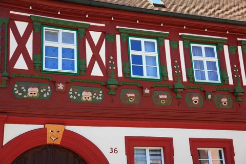 The clockmaker's house, two-storey and eaves-standing gabled roof building with richly carved
