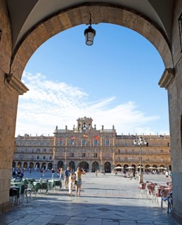Plaza Mayor viewed through an arcade, Salamanca, Salamanca province, Castile and Leon, Spain,