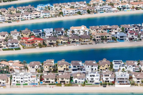 Artificial island in the shape of a palm tree The Palm Jumeirah with luxury villas properties in