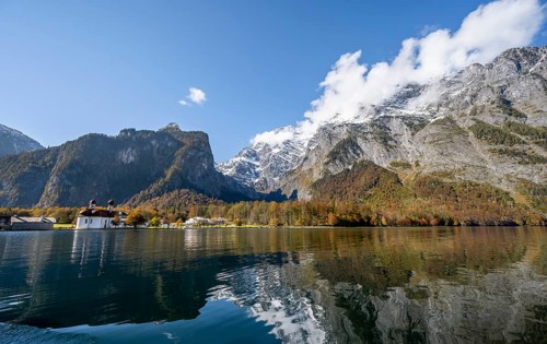 Königssee with Watzmann massif and pilgrimage church of St. Bartholomä, autumnal mountain landscape