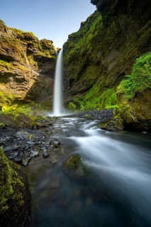 Kvernufoss waterfall, in summer when the weather is fine, gorge and river, long exposure, Skogar,
