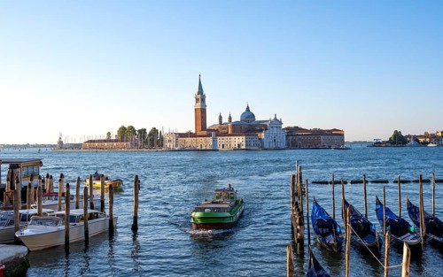 Vaporetto and gondolas, San Giorgio Maggiore church in the background, evening light, Venice,
