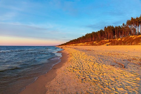 Beach at sunset, close to Stegna, a village in Nowy Dwór Gdanski County, Pomeranian Voivodeship, in