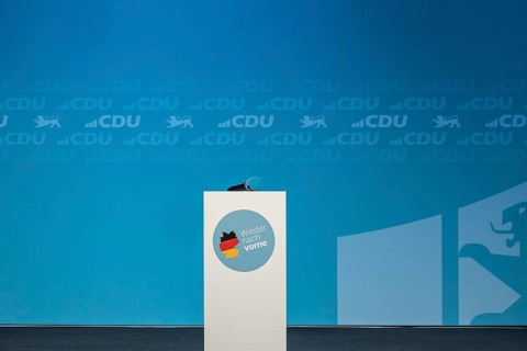 Election event for the Bundestag elections. Empty stage with lectern and logo of the CDU party and