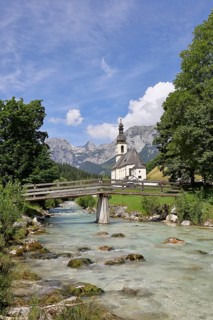 Parish church of St Sebastian with Ramsauer Ache, Reiteralpe in the background, Ramsau,