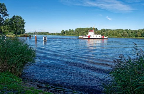 The Burg canal ferry crosses the Kiel Canal. Burg, Schleswig-Holstein, Germany, Europe