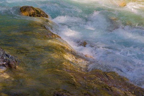 Rissbach creek, Eng valley, stones and flowing water