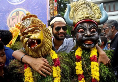 Traditional Kummatti dancers wear colourful wooden masks gods Kummatti Mahotsavam celebrate Onam