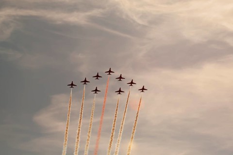BAE Systems Hawk nine aircraft of the RAF Royal air force Red Arrows display team flying, England,