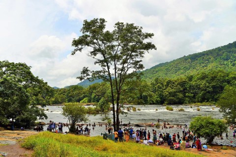 People bathing, Chalakudy River, Vazhachal Forest, Thrissur, Kerala, India, Asia