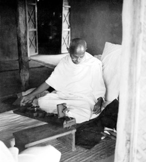 Mahatma Gandhi at the wheel at Sevagram Ashram, wardha, Maharashtra, India, 1939 - MODEL RELEASE