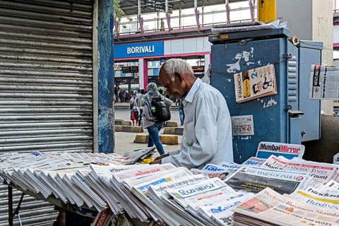 Newspaper vendor at Borivali Railway Station, Mumbai, Maharashtra, India, Asia