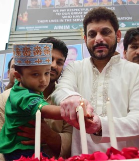 All India Majlis-e-Ittehadul Muslimeen (AIMIM) workers pay candle light tribute to slain Indian