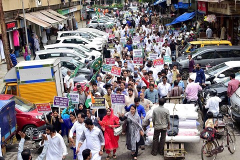 All India Majlis-e-Ittehadul Muslimeen (AIMIM) workers take a part in rally to pay tribute to slain