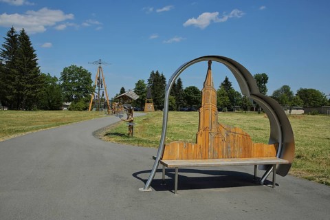 Bench with church at the Exulantenweg, figure, wooden sculpture, footpath, Johanngeorgenstadt,