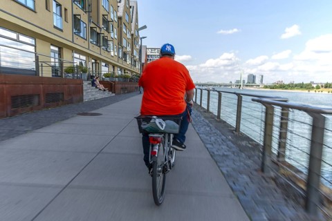 Cycling from the first-person perspective on a shared footpath and cycle path in Cologne, North