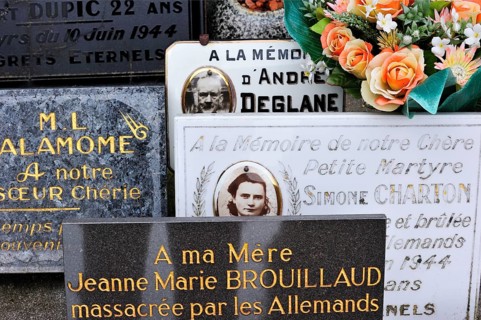 Graves of the murdered inhabitants in the cemetery. The burnt village of Oradour-sur-Glane was